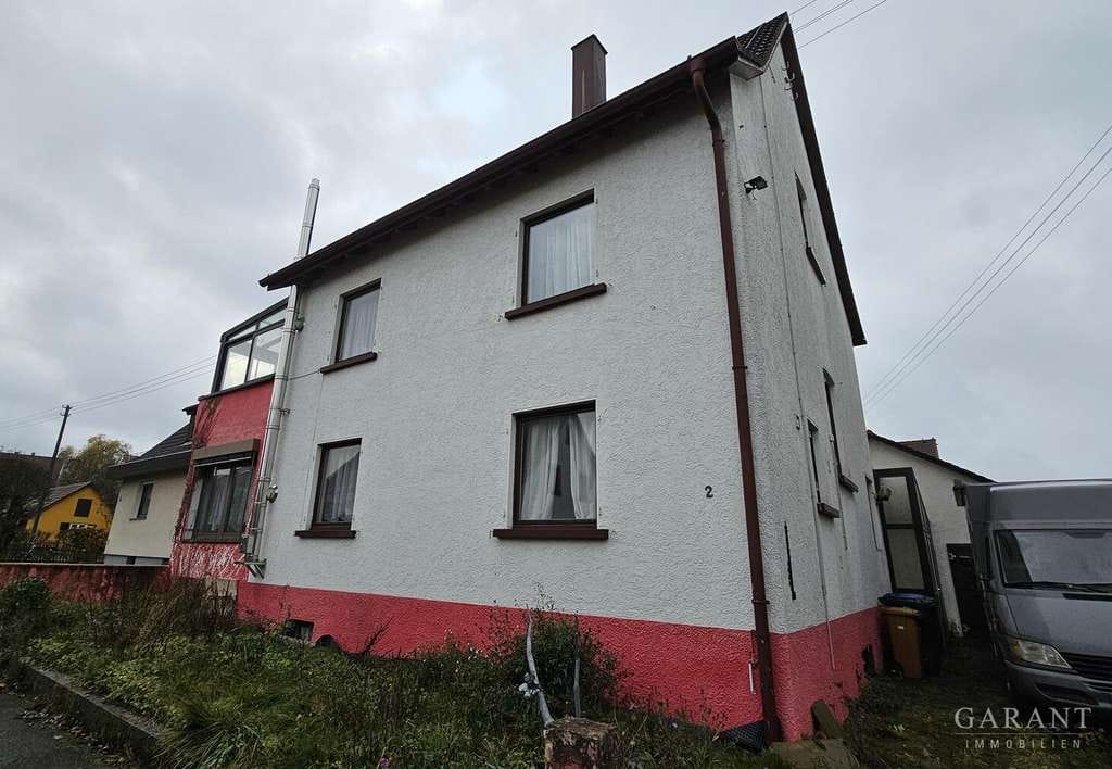 Immobilie in Steinheim am Albuch - Einfamilienhaus mit Wintergarten und viel Potential - Bild 0
