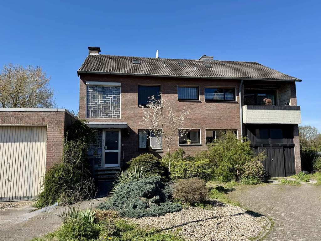 Immobilie in Hünxe - Familienfreundliche Erdgeschosswohnung mit Garten und Garage unweit der Uferpromenade des Kanals! - Bild 0