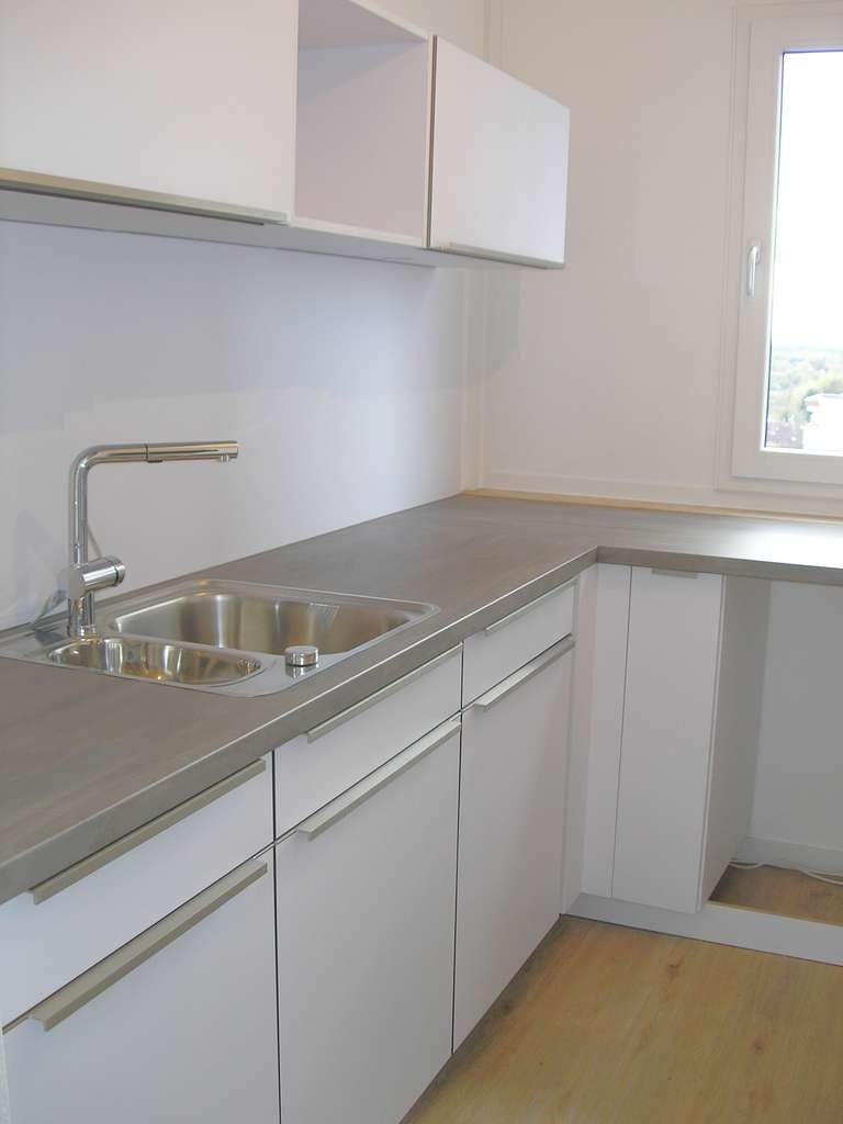 Immobilie in Langen - Vermietete 3,5-Zimmer-Wohnung mit Garage, Stellplatz und Einbauküche, Wohnanlage mit Komfort - Bild 2