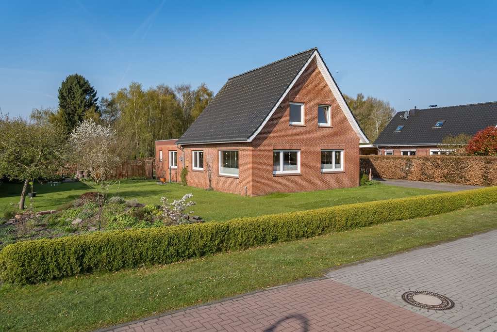 Immobilie in Apen - Modernisiertes Einfamilienhaus mit Garage in Augustfehn II - Bild 1