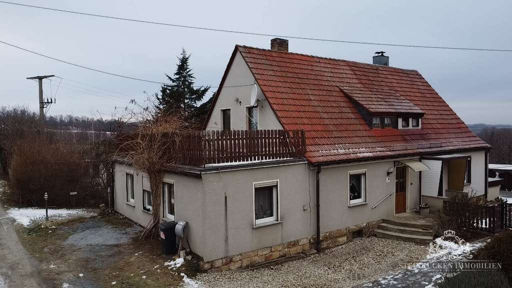 Immobilie in Dohna - Doppelhaushälfte mit weitem Blick und Zukunftsfläche - Bild 0