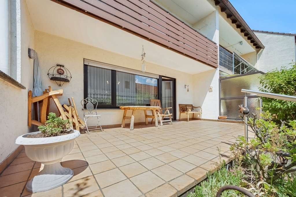 Immobilie in Kleinostheim - Wohnen, wo andere Urlaub machen – Ihr Zuhause mit Mainblick und Gartenidylle - Bild 4