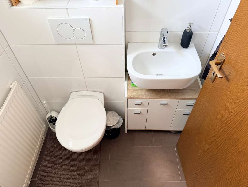 Immobilie in Erlensee - Attraktives Mehrfamilienensemble – Drei vermietete Reihenhäuser in Split-Level-Bauweise in Erlensee - Bild 3