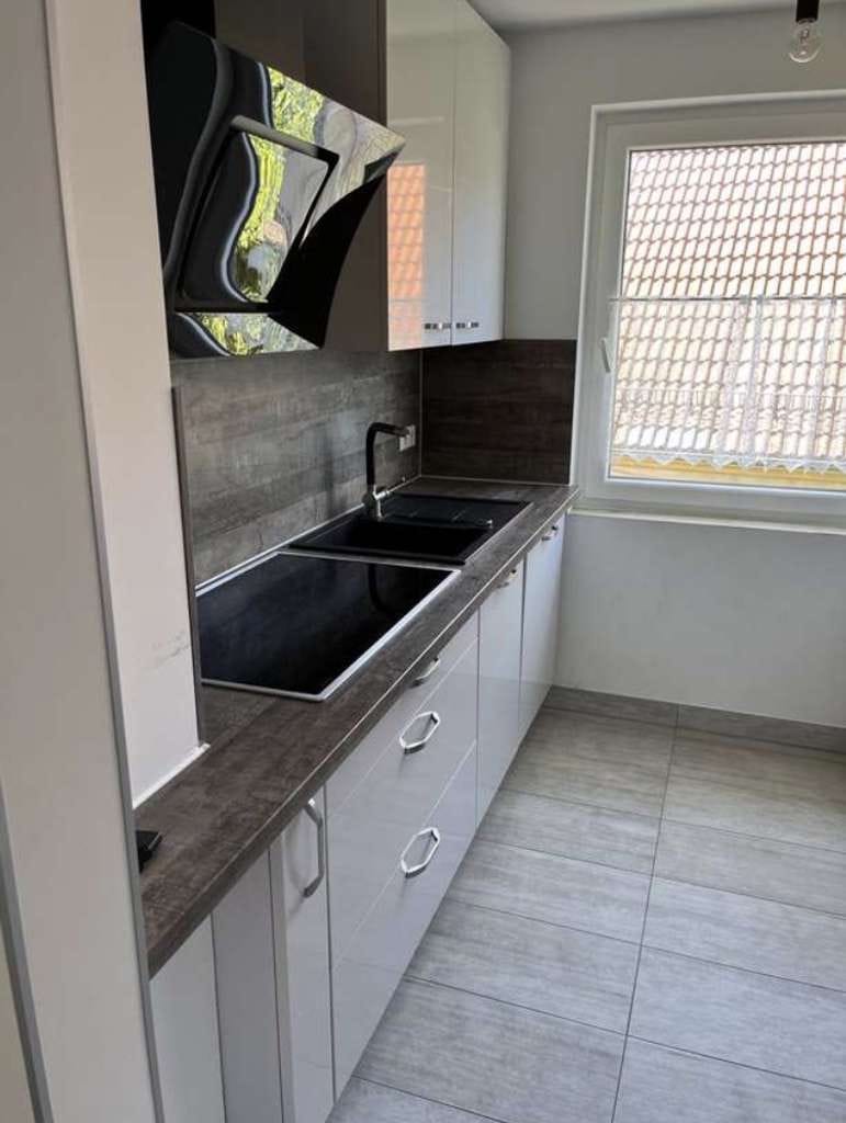 Immobilie in Steinenbronn - Kernsanierte 3-Zimmer-Wohnung mit Balkon, Keller & Garage in ruhiger Lage von Steinenbronn - Bild 2