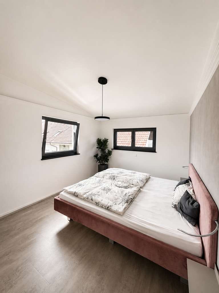 Immobilie in Malterdingen -  Moderne 5-Zimmer-Wohnung mit hochwertiger Ausstattung und Garten am Dorfbach - Bild 3