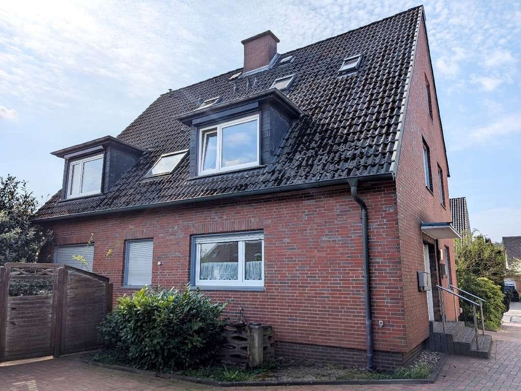 Immobilie in Hasbergen - Solides und gepflegtes Zweifamilienhaus mit ausgebautem Dachgeschoss in Hasbergen - Bild 2