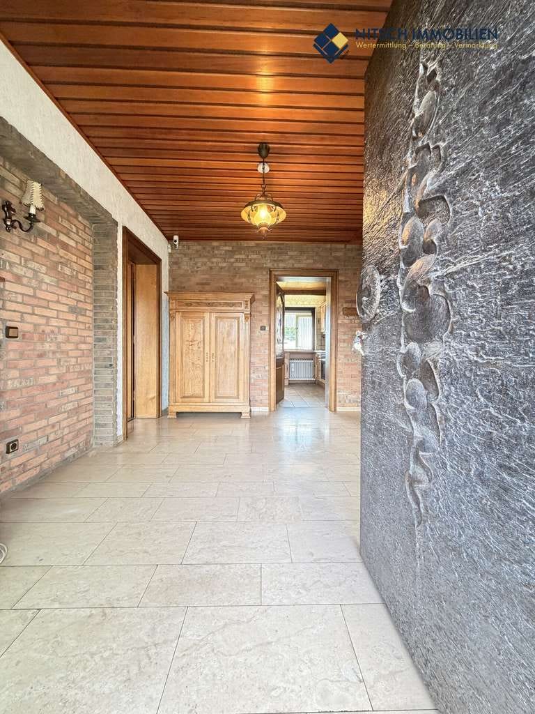 Immobilie in Geilenkirchen - Bungalow und Zweifamilienhaus mit großem Grundstück und vielfältigen Nutzungsmöglichkeiten - Bild 3