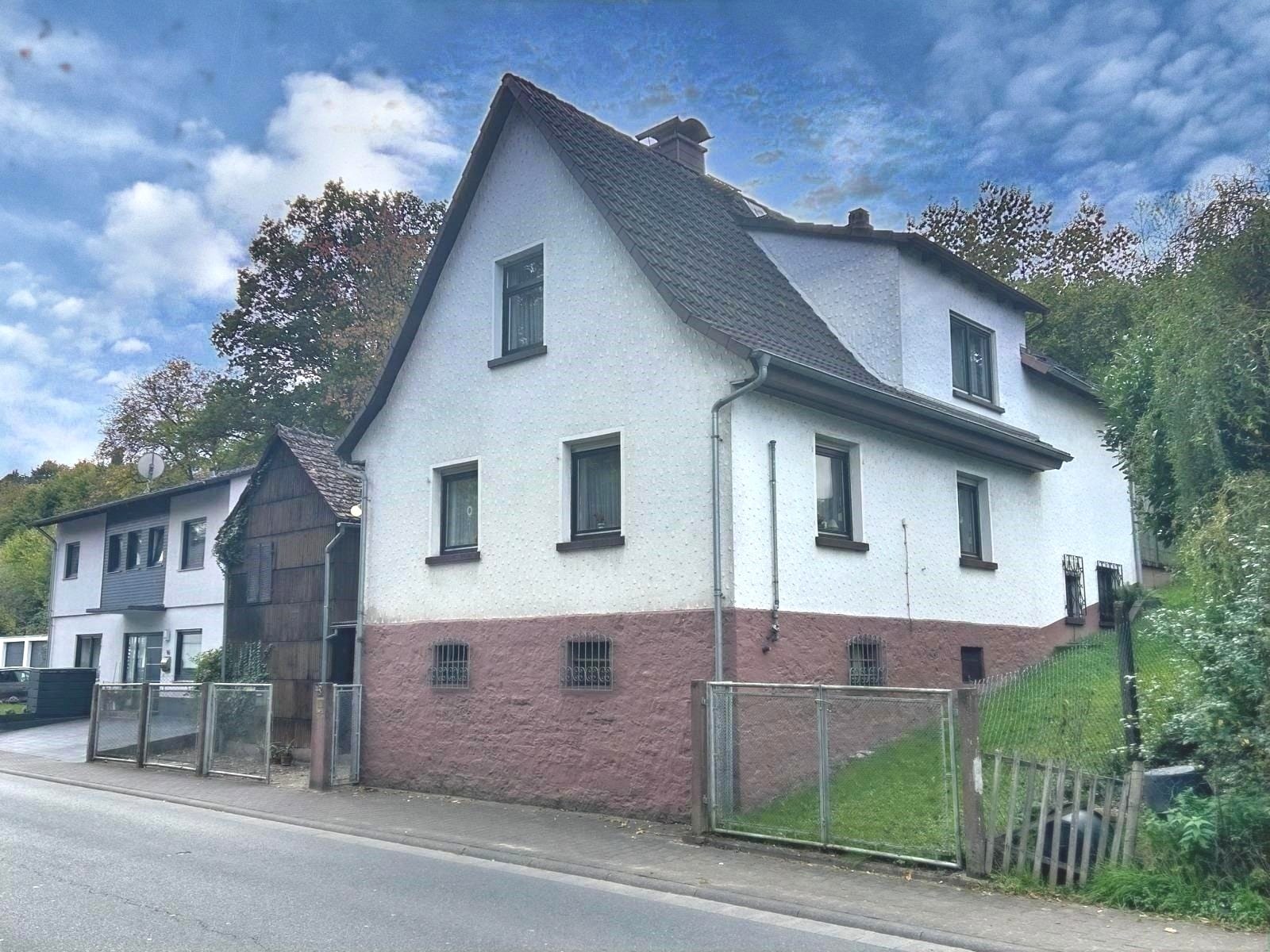 Immobilie in Erbach - Für Gartenfreunde - vielfältiges Einfamilienhaus mit schönem Garten und kleinem Nebengebäude - Bild 3