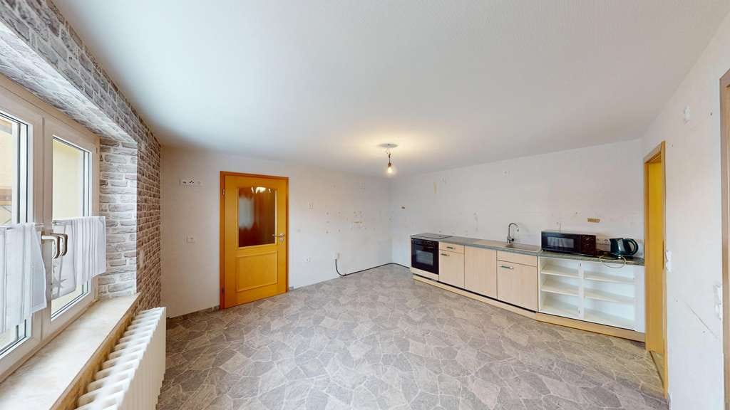 Immobilie in Kölleda - Gepflegte Doppelhaushälfte mit großem Grundstück, Garage und vielseitigem Nebengebäude in Kölleda - Bild 2