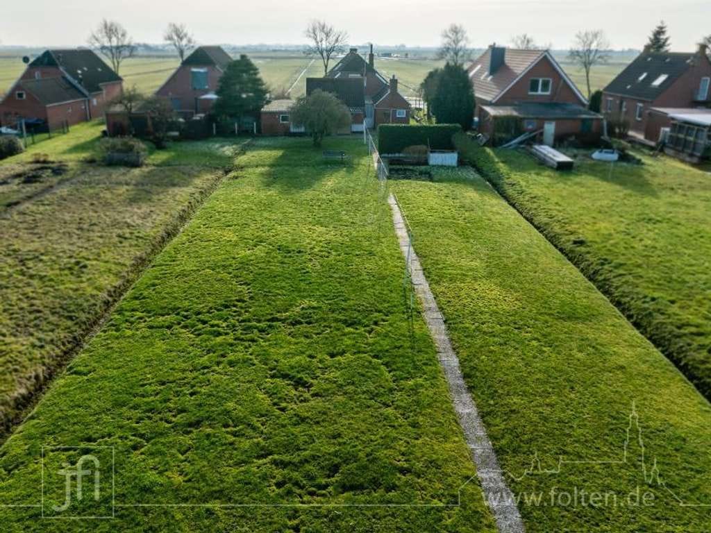 Immobilie in Jemgum - Hinter dem Haus der Deich, und nach vorne weites Land... - Bild 1