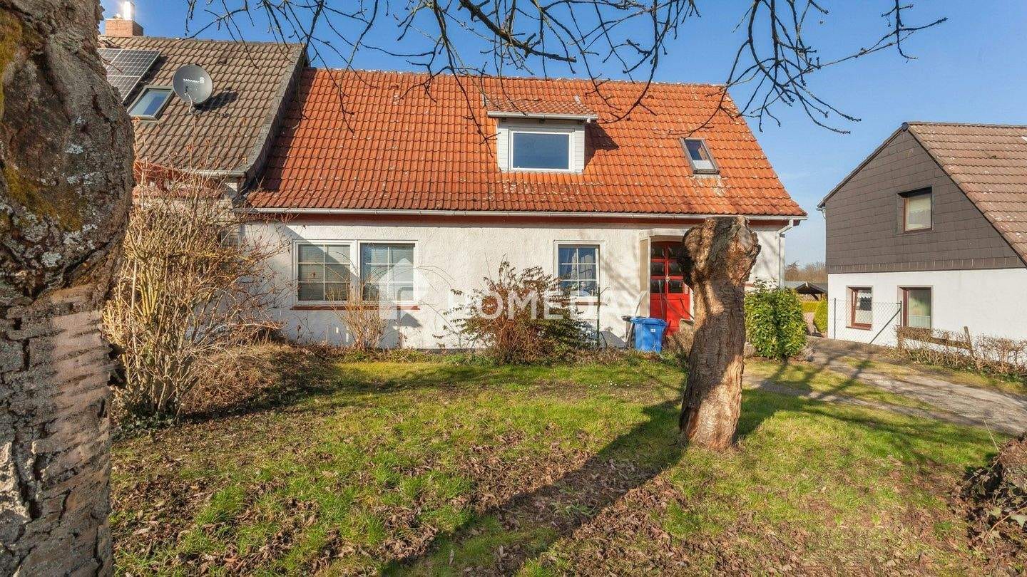 Immobilie in Salzgitter - Sanierungsbedürftige Doppelhaushälfte mit 6 Zimmern, großem Grundstück und viel Potenzial - Bild 2