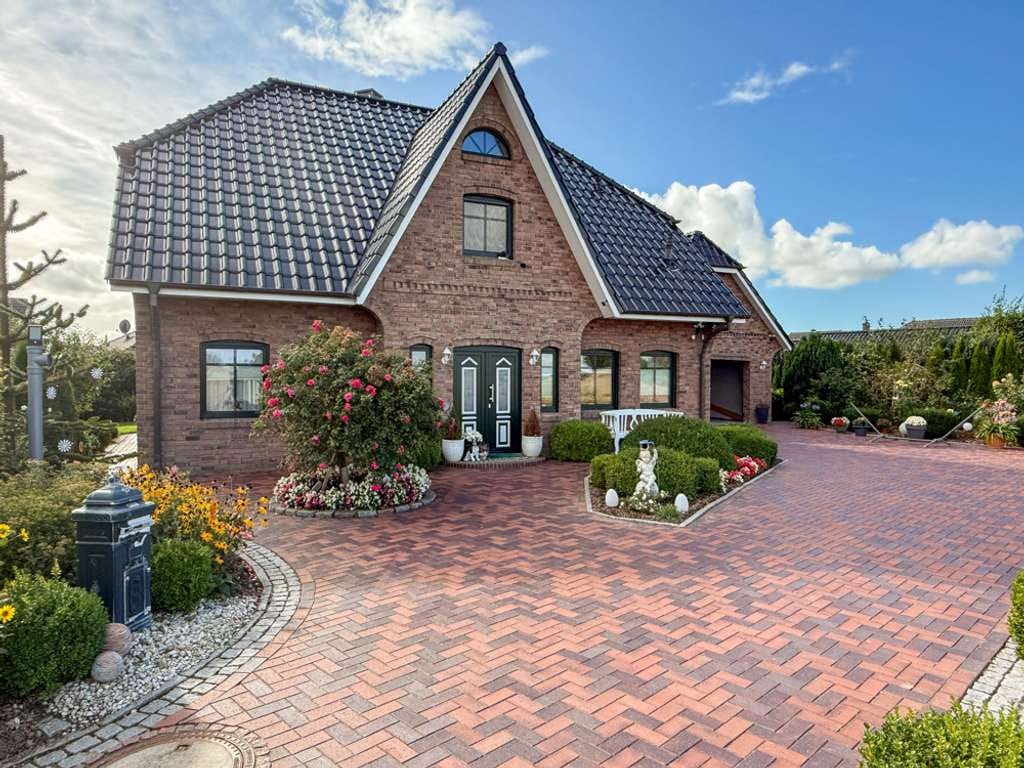 Immobilie in Epenwöhrden - Typisch friesisch, top-gepflegt, viel Platz: modernes Einfamilienhaus in der Nähe von Heide. - Bild 0