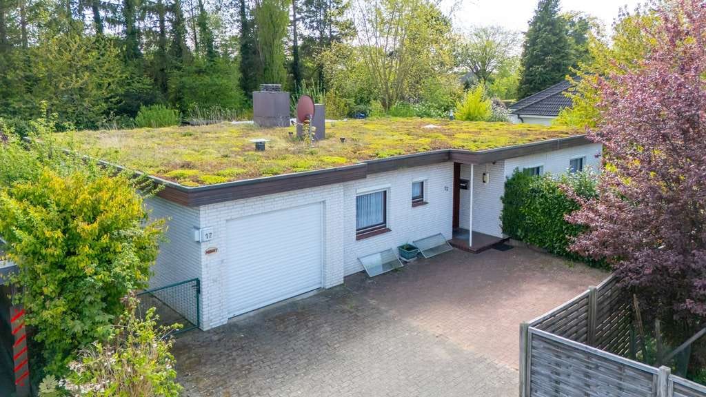 Immobilie in Malente - Bungalow mit Wintergarten und großem Garten in beliebter Lage von Malente - Bild 1
