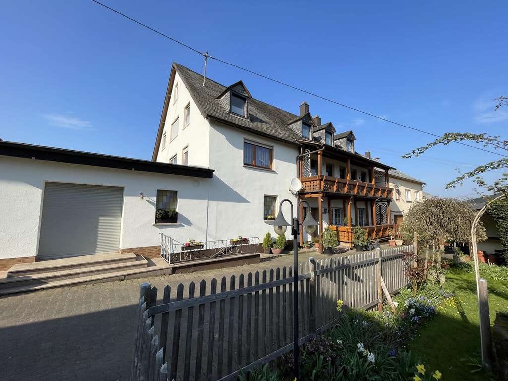 Immobilie in Osann-Monzel - Mehrfamilienhaus mit ehemaliger Ladenfläche - Bild 0