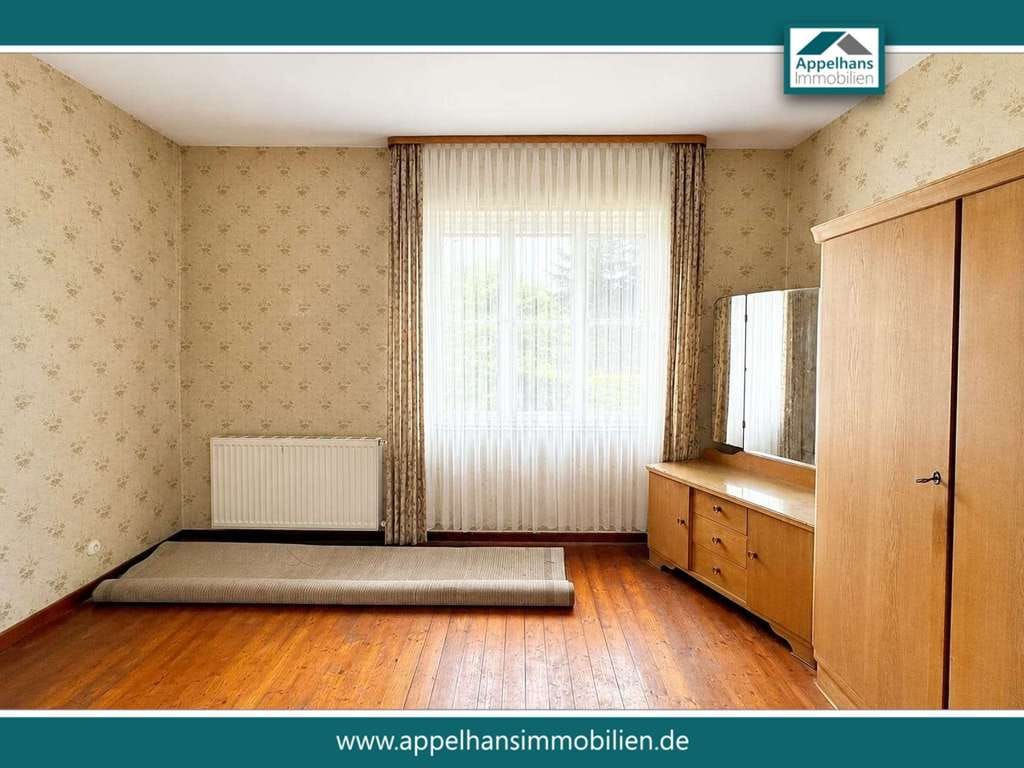 Immobilie in Georgsmarienhütte - Einfamilienhaus mit großem Grundstück in Kloster Oesede - Bild 1