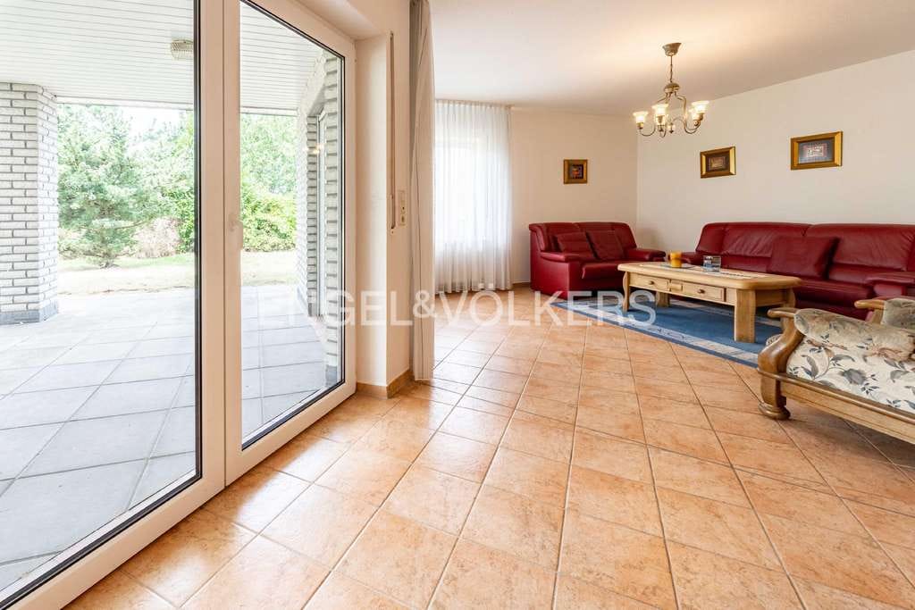 Immobilie in Lünne - Bungalow mit überdachter Terrasse, Werkstatt & Ausbaureserve im Dachgeschoss - Bild 2