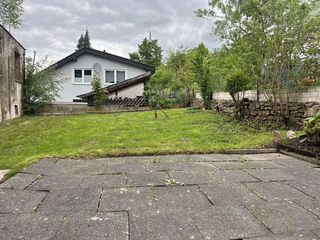 Immobilie in Guxhagen - Haus aus Fachwerk mit Garten in zentraler Lage von Guxhagen - Reihenendhaus - Bild 1