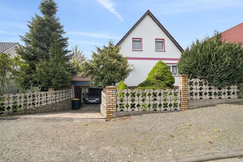 Immobilie in Lossatal - Familienfreundliches Wohnen in Lossatal – Einfamilienhaus mit Garten, Keller und Tiefgarage! - Bild 1