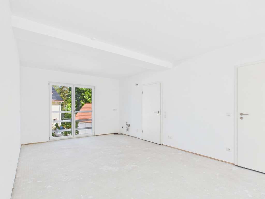 Immobilie in Grafrath - Charmantes Eckhaus mit drei Wohneinheiten und sonnigem Grundstück - Bild 4