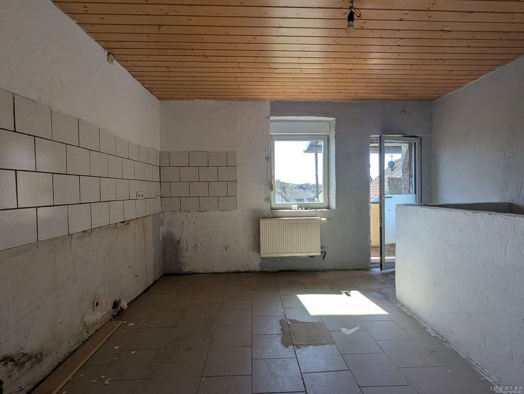 Immobilie in Schiffweiler - Gemütliches Einfamilienhaus mit Garten, Balkon & viel Potenzial in Schiffweiler - Bild 3