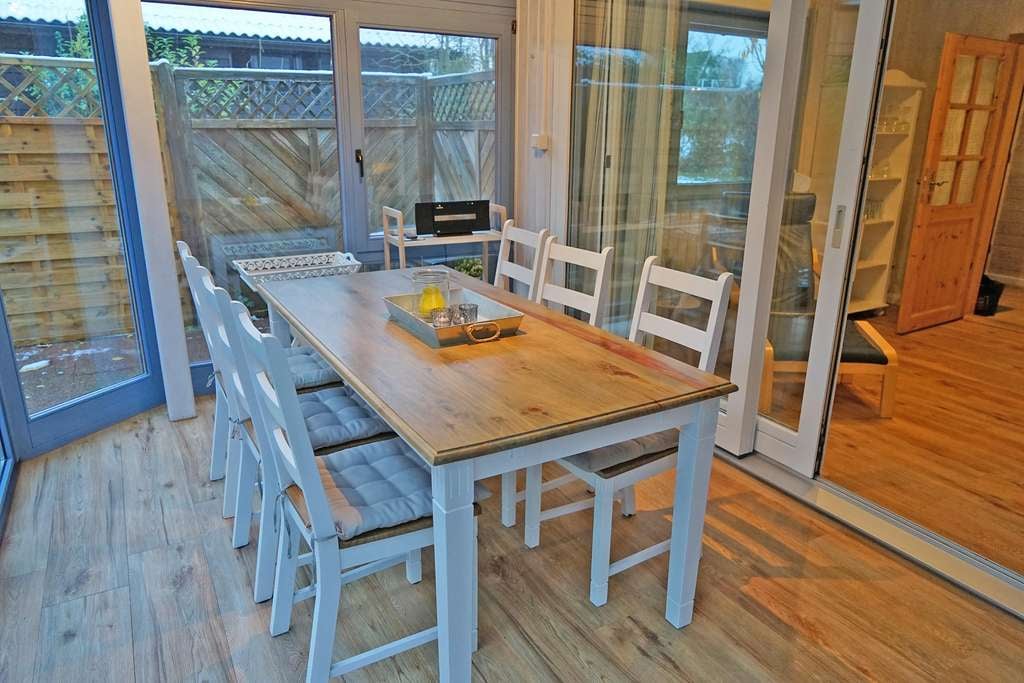Immobilie in Damp - Blockhaus in TOP-Lage mit großem Grundstück und Wintergarten - Bild 2