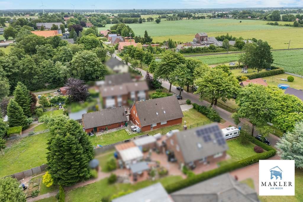 Immobilie in Südbrookmerland - ~~Wo Wohnen und Handwerk zusammenfinden – charmantes Einfamilienhaus mit Extras~~ - Bild 1