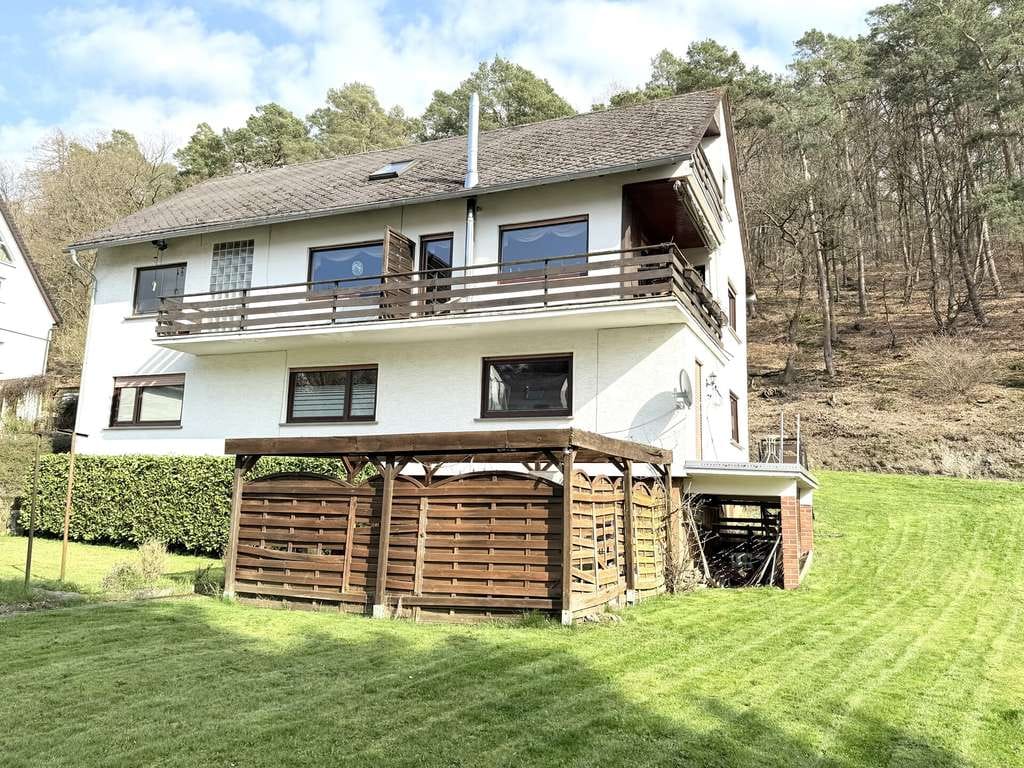 Immobilie in Dahlheim - Solides Wohnhaus mit 2 Wohneinheiten und weitläufigem Gartenparadies - Bild 3