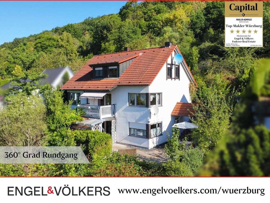 Immobilie in Gemünden am Main - Wohnen mit Weitblick: Familienhaus im Grünen mit Blick ins Maintal - Bild 0
