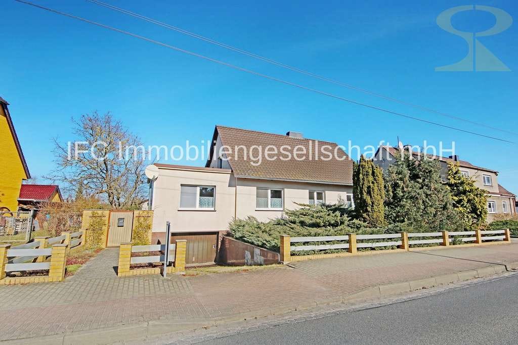 Immobilie in Jessen (Elster) - Einfamilienhaus mit Einliegerwohnung und Nebengelass in Jessen (Elster) OT Holzdorf - Bild 0