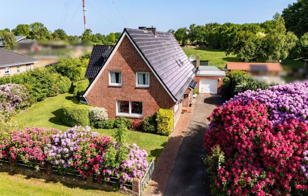 Immobilie in Welmbüttel - Wohnen in ruhiger Naturkulisse – Gepflegtes Zweifamilienhaus am Waldrand in Welmbüttel - Bild 0