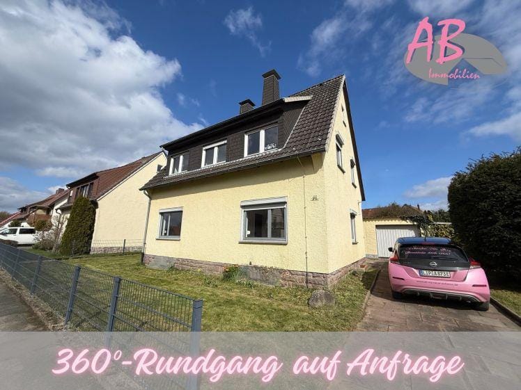 Immobilie in Dörentrup - Großzügiges Einfamilienhaus mit Garten und Garage in gepflegter Siedlung - Bild 0