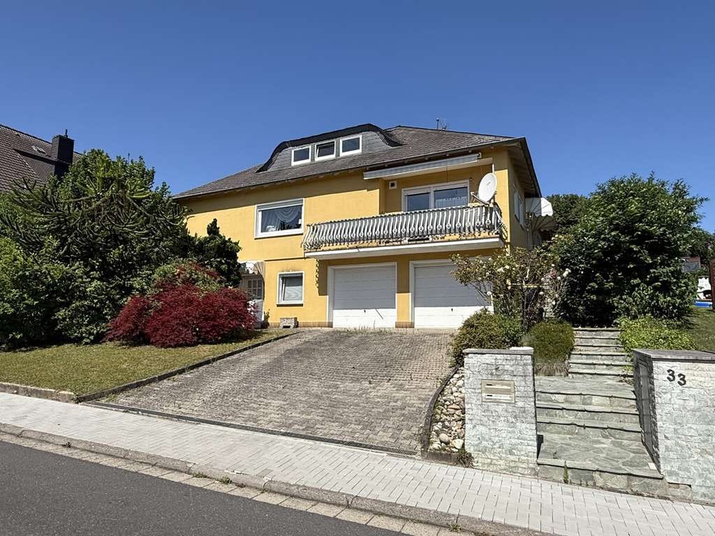 Immobilie in Nidderau - Stilvolles Einfamilienhaus im gehobenen Bungalow-Segment mit eigenständiger Einliegerwohnung - Bild 0