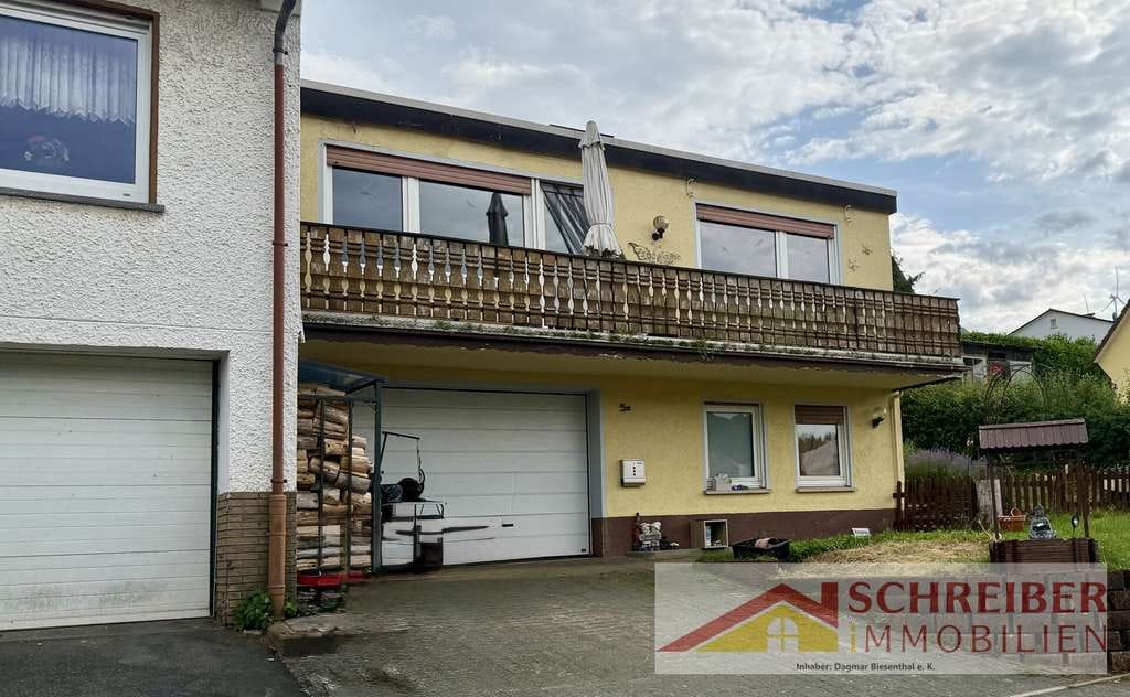Immobilie in Bad Laasphe - Doppelhaushäfte mit Garage in Bad Laasphe zu verkaufen - Bild 1