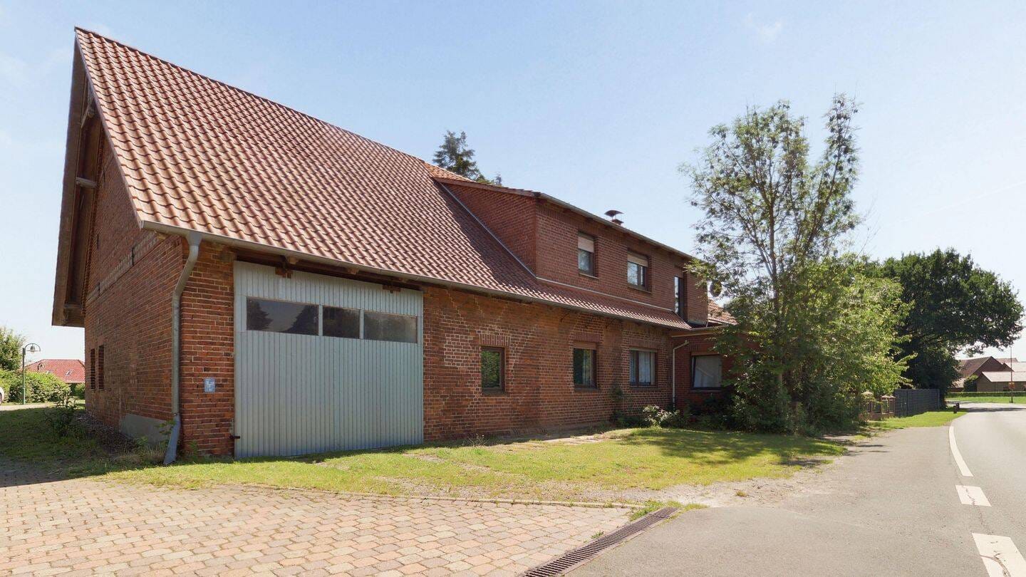 Immobilie in Stolzenau - Viel Platz, vielseitige Nutzung - großzügiges Zweifamilienhaus mit idyllischem Naturgarten - Bild 3