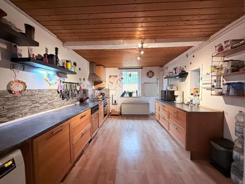 Immobilie in Barntrup - Charmantes Zweifamilienhaus mit Fachwerkstil, großem Garten und vielseitigem Raumkonzept - Bild 4