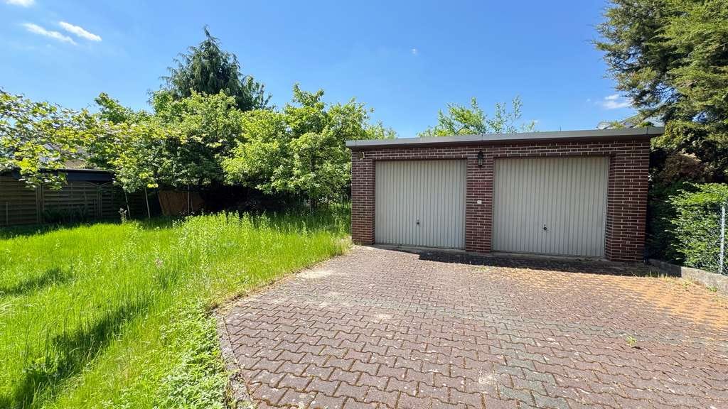 Immobilie in Egelsbach - Freistehendes Mehrfamiliehaus mit ELW und Doppelgarage in ruhige Lage, Egelsbach - Bild 4