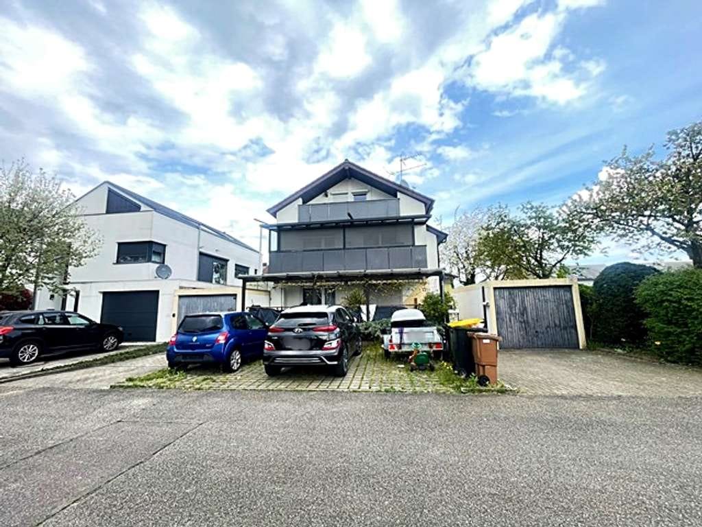 Immobilie in Rastatt - Vier-Zimmer-Wohnung mit Garten und Garage in Rastatt-Rheinau - Bild 0