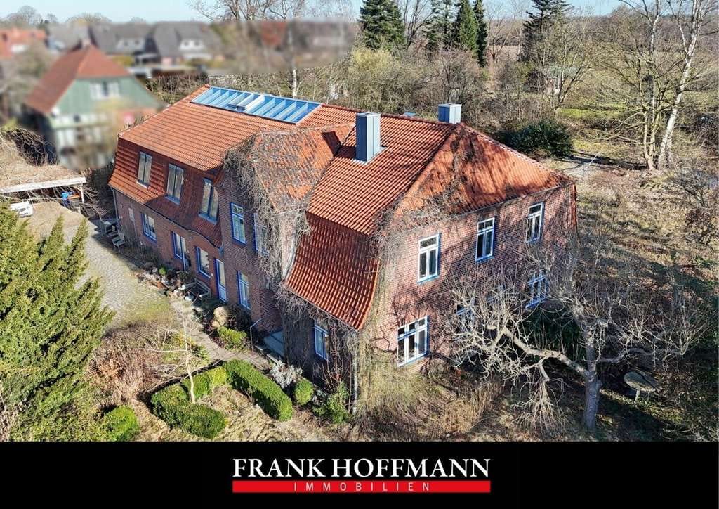 Immobilie in Rickling - Großzügiges Bauernhaus mit vermieteter Einliegerwohnung in Ricklingen - Bild 0