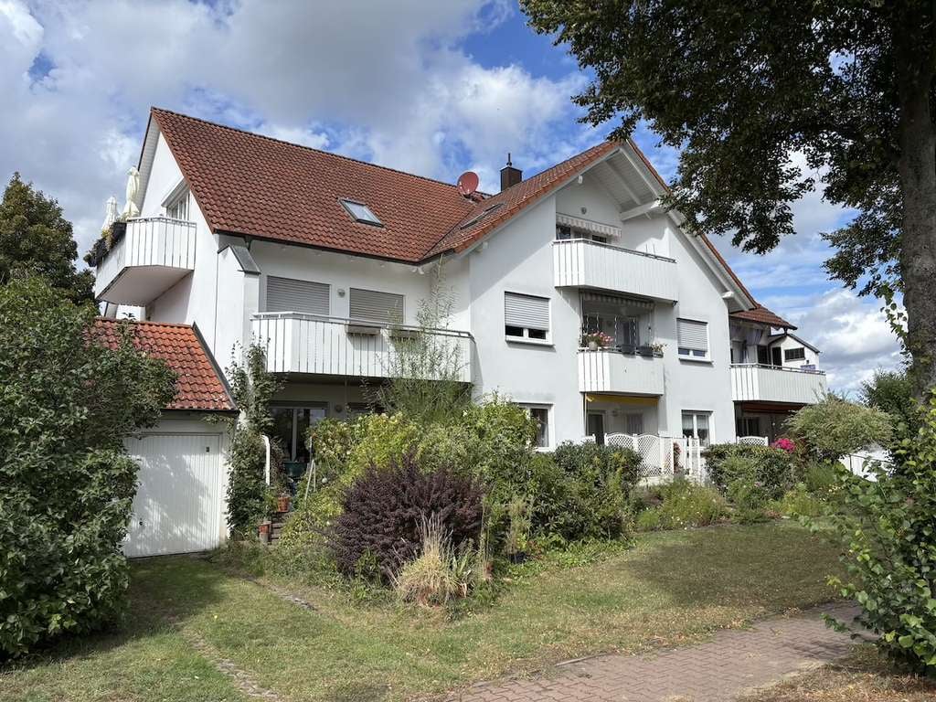 Immobilie in Beelitz - Vermietete 86 qm Etagenwohnung mit Balkon und Garage - Bild 1