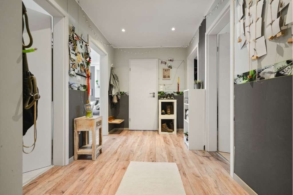 Immobilie in Hartenholm - 3‑Zimmer‑Wohnung mit Gartenanteil, großer Fensterfront & überdachter Terrasse - Bild 2