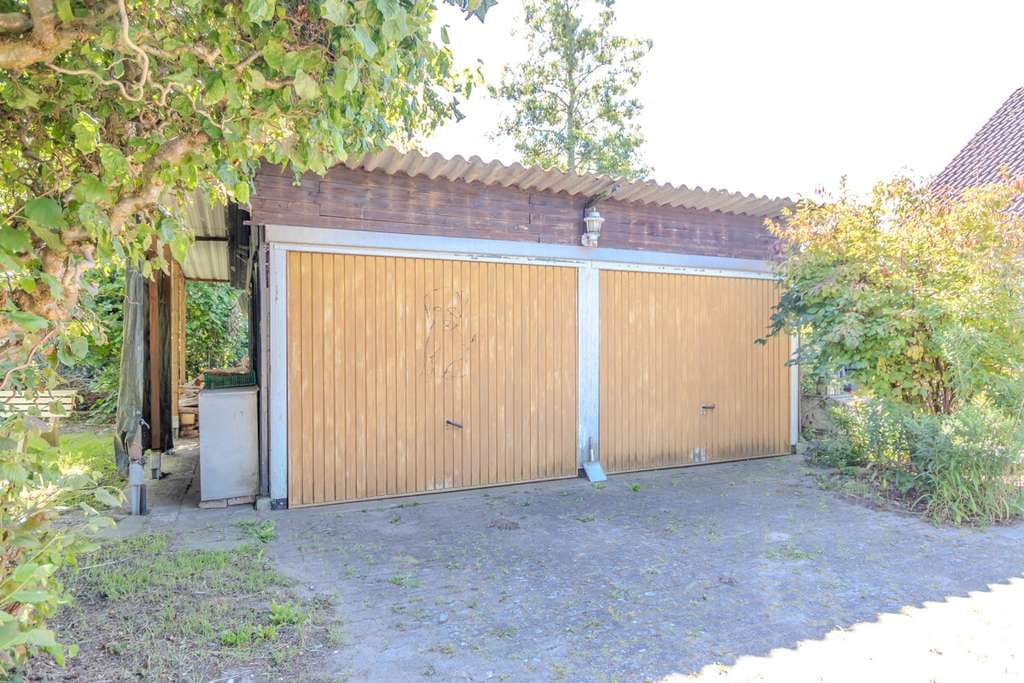 Immobilie in Schnackenburg - Einfamilienhaus mit Gartenhaus und zwei Garagen in Elbnähe - Bild 2