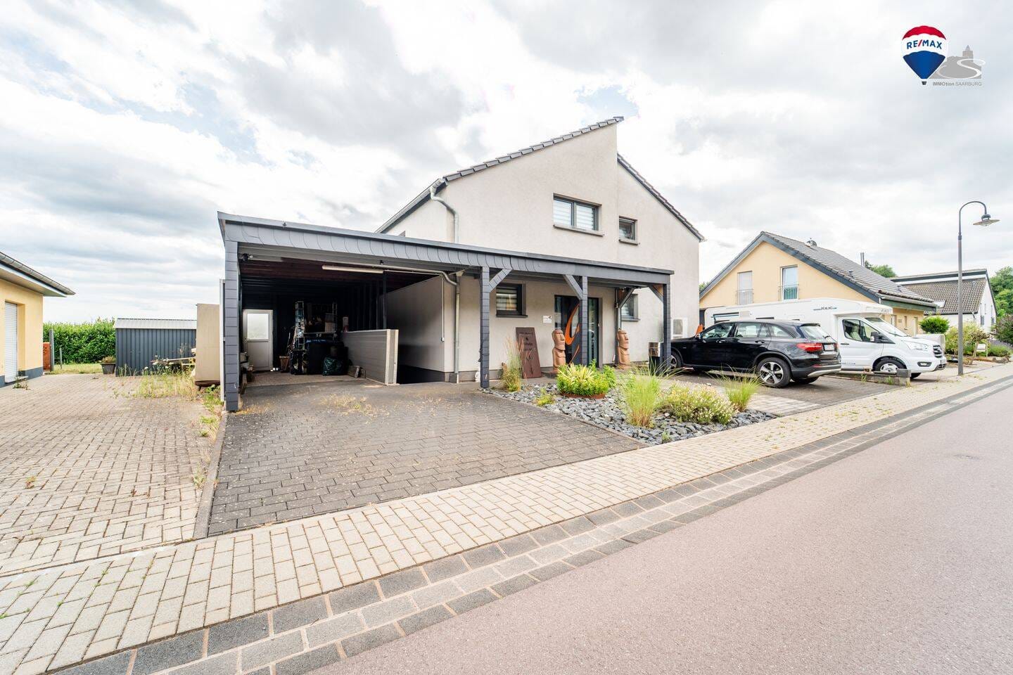 Immobilie in Kirf - Einziehen & wohlfühlen - modernes Zweifamilienhaus mit ELW & Wintergarten - Bild 2