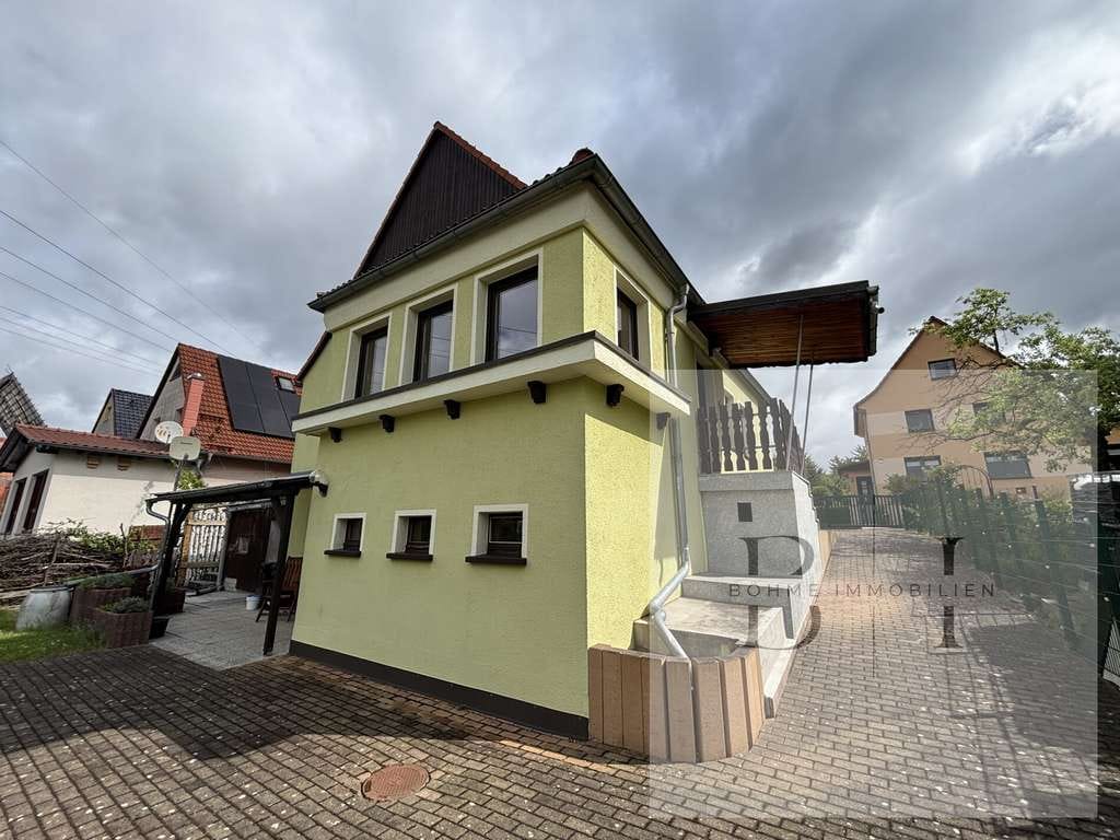 Immobilie in Saalfeld/Saale - Wohnen im Grünen – Freistehendes Einfamilienhaus mit großem Grundstück, Terrassen & Weitblick - Bild 4
