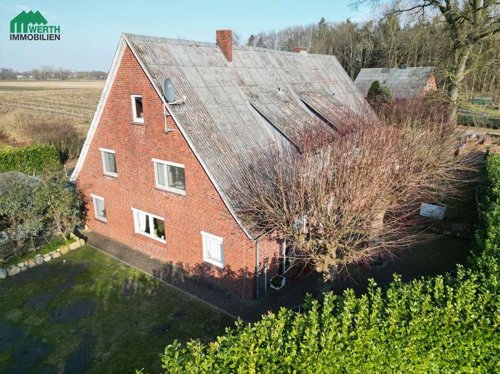 Immobilie in Burweg - Wohnen, vermieten oder zusammenleben – mit Gartenidylle und viel Platz im Grünen - Bild 3