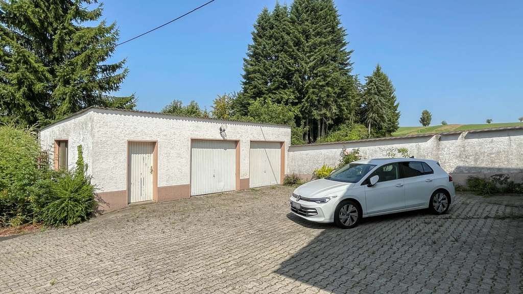 Immobilie in Mammelzen - Geräumiger Bungalow mit großem Grundstück und Doppelgarage am Ortsrand von Altenkirchen! - Bild 5