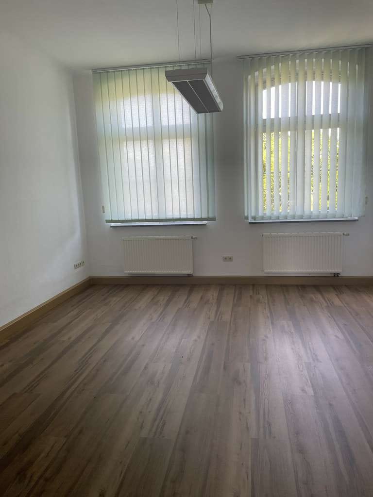 Immobilie in Rothenburg/Oberlausitz - Modernisiertes Mehrfamilienhaus mit attraktiver Gewerbeeinheit – Ihre Investitionschance! - Bild 2