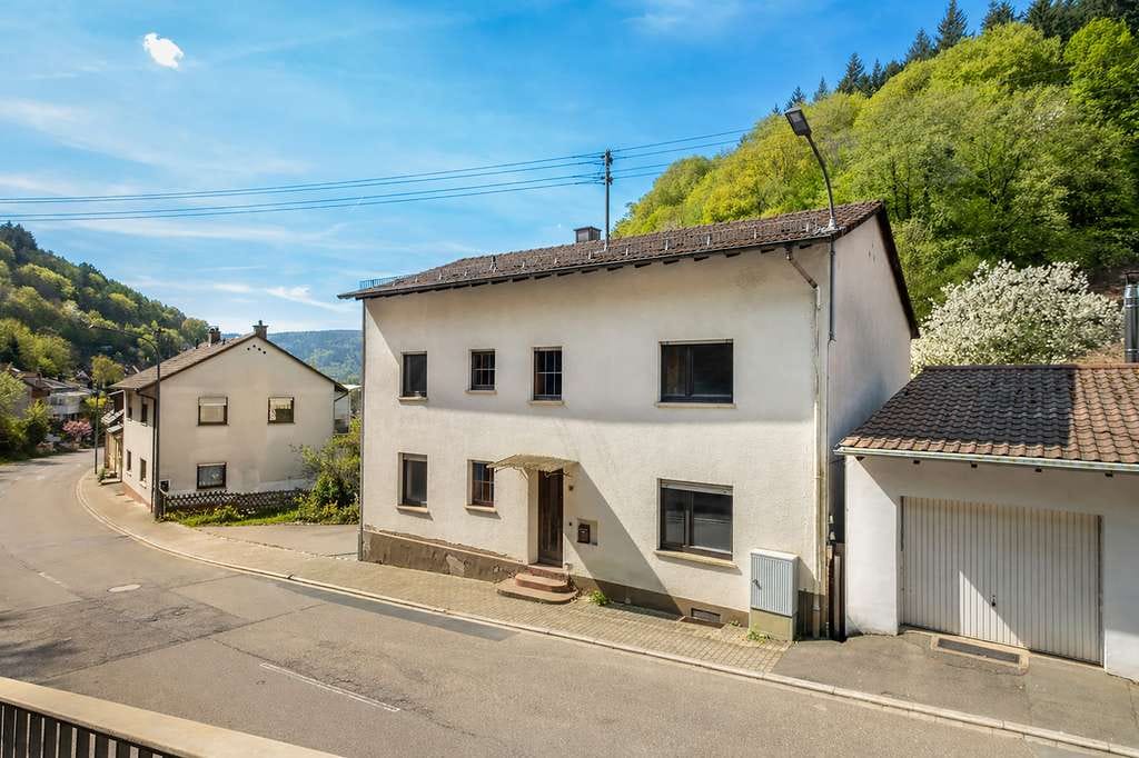 Immobilie in Heidelberg - Großzügig Wohnen mit Blick in die Natur: Zweifamilienhaus mit Einliegerwohnung in Ziegelhausen - Bild 1