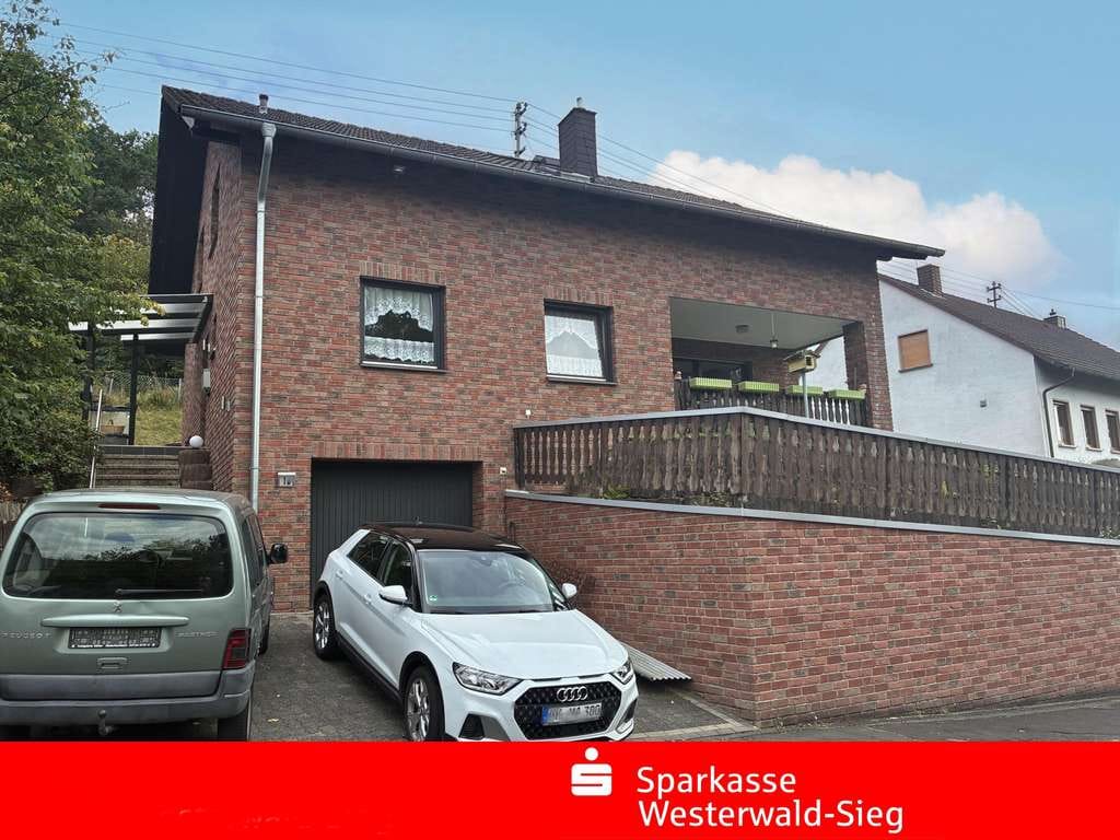 Immobilie in Niederfischbach - Ihr neues Zuhause in Niederfischbach - 
Verklinkertes Einfamilienhaus mit Garage - Bild 0