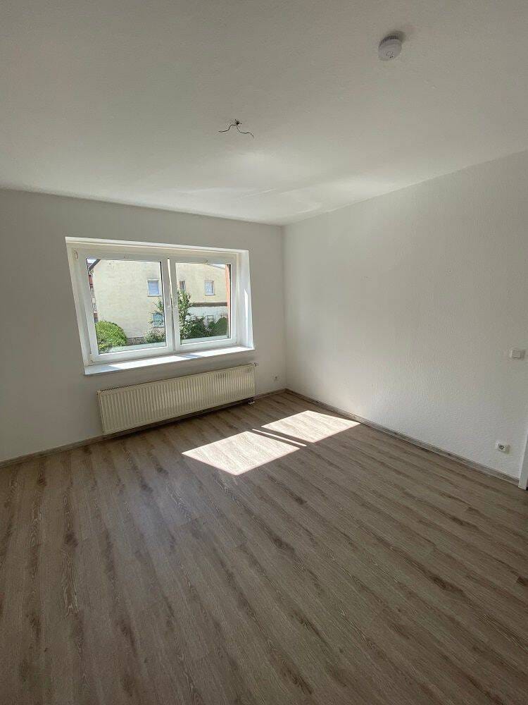 Immobilie in Querfurt - Voll vermietetes Mehrfamilienhaus mit 4 Wohnungen,  Grundstück und Stellplätzen in Querfurt OT Spielberg - Bild 3