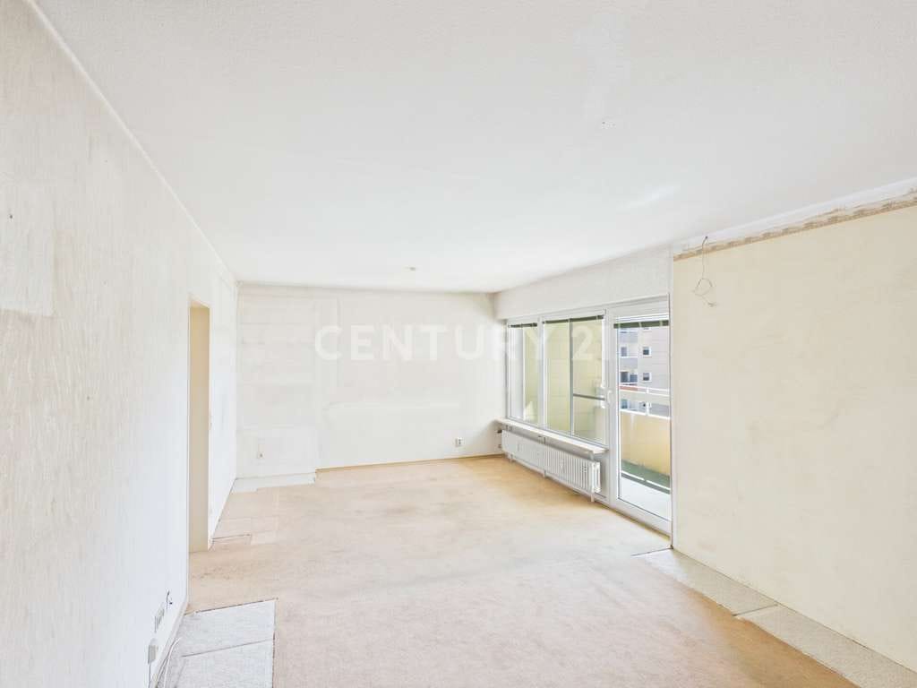 Immobilie in Traunreut - 3-Zimmer-Wohnung mit Balkon, Garage & viel Potenzial in Traunreut - Bild 3